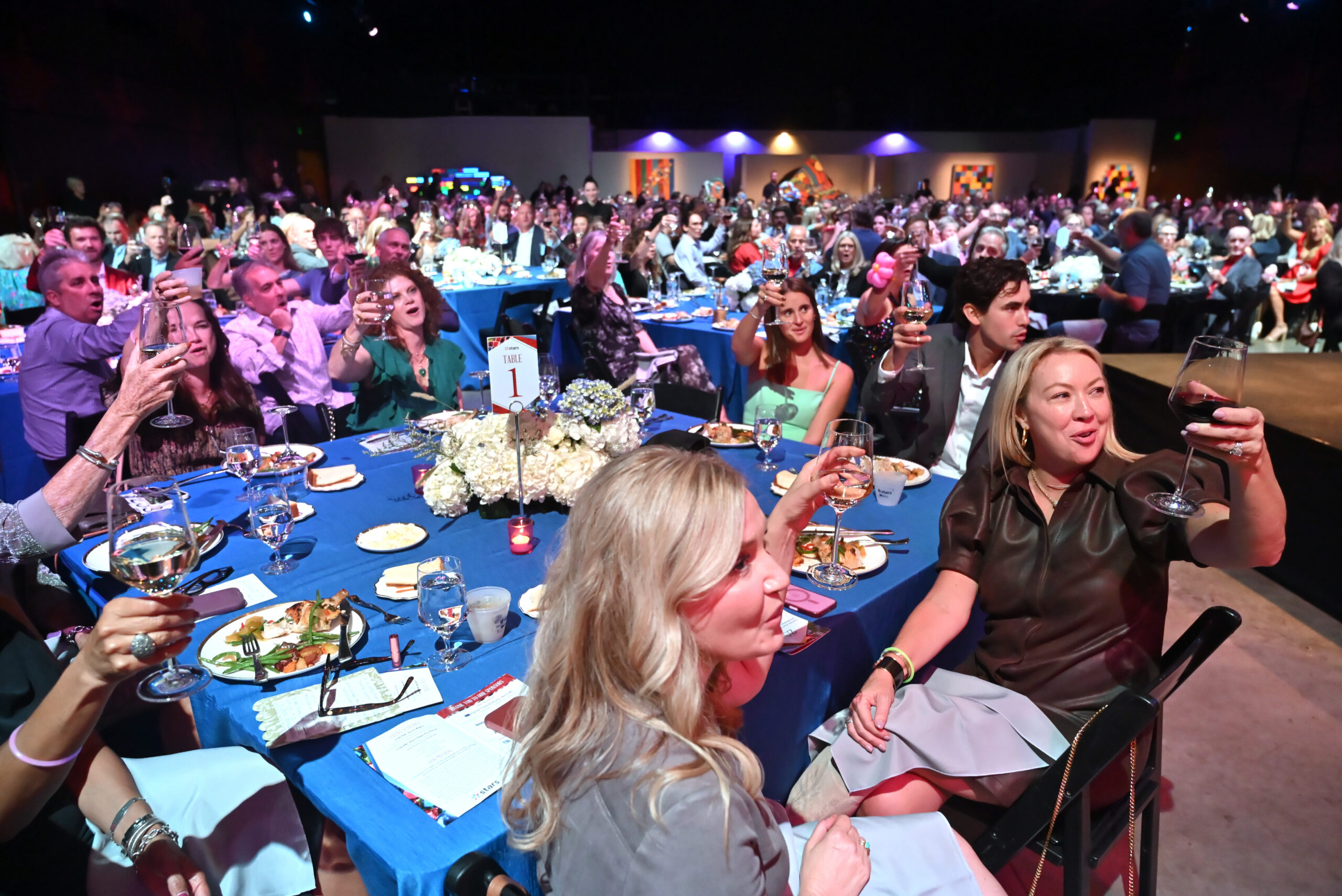 Guests connecting at STARS Rising fundraising event in Nashville supporting youth mental health programs at STARS Nashville
